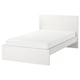White MALM bed: sleek, minimalist design with high headboard, modern style.