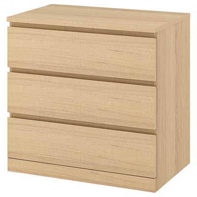 A MALM chest of drawers in oak veneer with three smooth-running drawers.