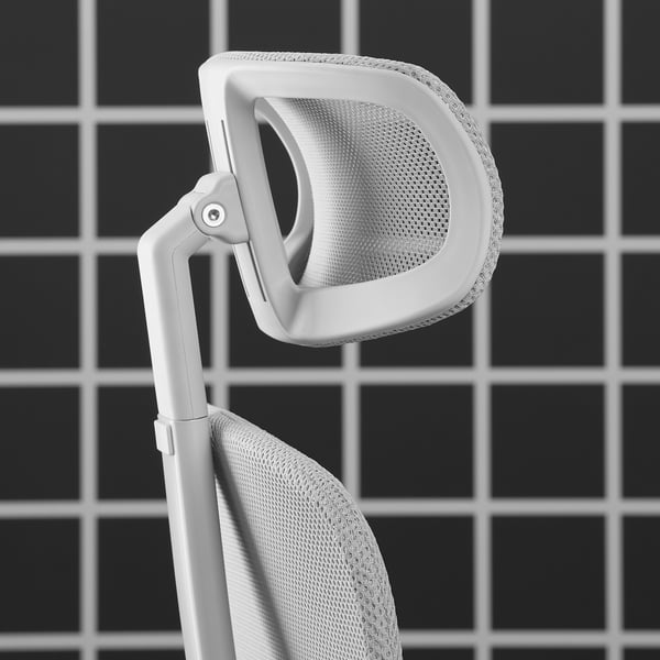 Gaming chair backrest with adjustable headrest and mesh design for comfort and air flow.