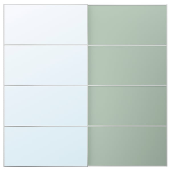 A pax wardrobe with MEHAMN/AULI sliding glass doors in a soft green shade, featuring a sleek, rectangular design with a modern aesthetic.