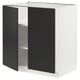 Modern ikea METOD kitchen unit in white and black. Slim, rectangular design with sleek matte finishes. Two doors, adjustable shelves.