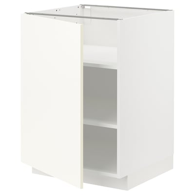 Ikea METOD white kitchen cabinet, open, with adjustable shelves.