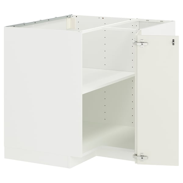 METOD corner kitchen unit in white; sleek, modern, cube shape; equipped with adjustable shelves, metal hinges.
