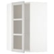White METOD corner cabinet with adjustable shelves.