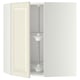 An open off-white METOD kitchen corner cabinet with an adjustable glass shelf and a central carousel pole.