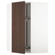 White ikea METOD kitchen cabinet with dark brown wooden door open, revealing glass shelves.