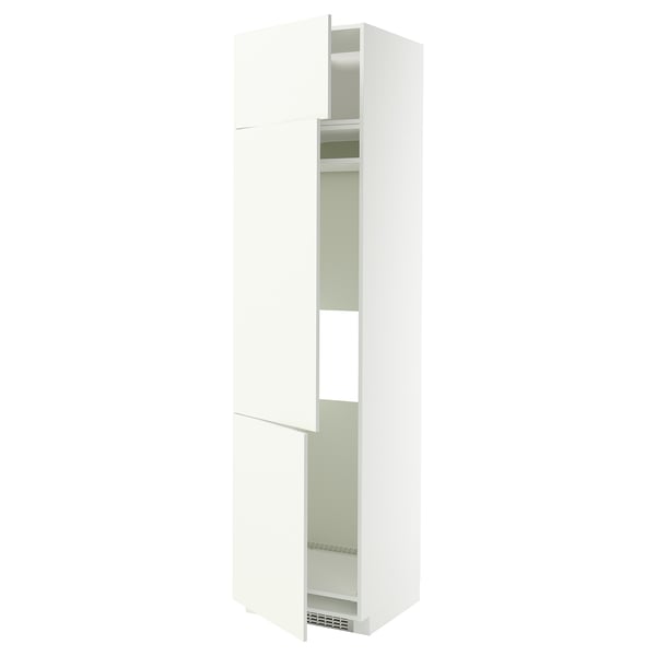 A white METOD kitchen cabinet from ikea. It is a tall, rectangular unit with adjustable shelves and reversible doors.