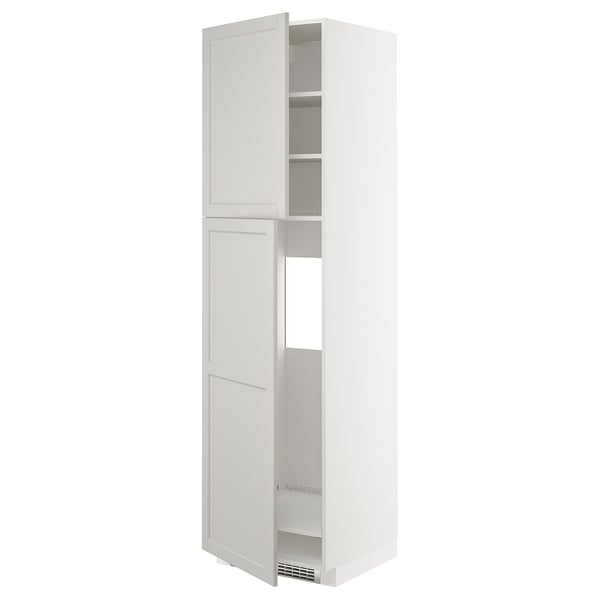 White METOD kitchen cabinet with beveled edges, tall and rectangular with two open doors revealing shelves.