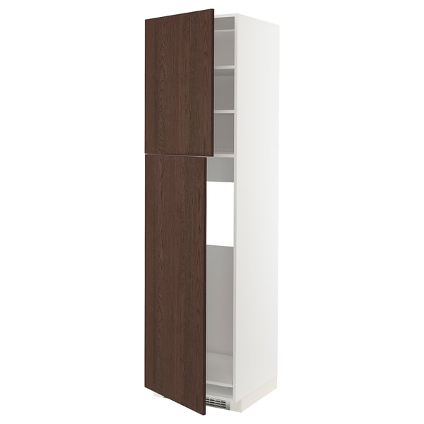 A tall, white METOD kitchen cabinet with dark brown sinarp wooden doors, featuring solid wood edging and an adjustable shelf inside.