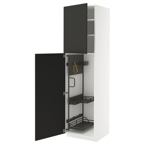 A modern white METOD kitchen cabinet with black nickebo doors, open to reveal storage shelves and pull-out organizers.