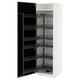 White METOD kitchen cabinet with black pull-out shelves, sleek modern design.