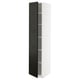White METOD tall cabinet with black door, beveled edges, adjustable shelves.