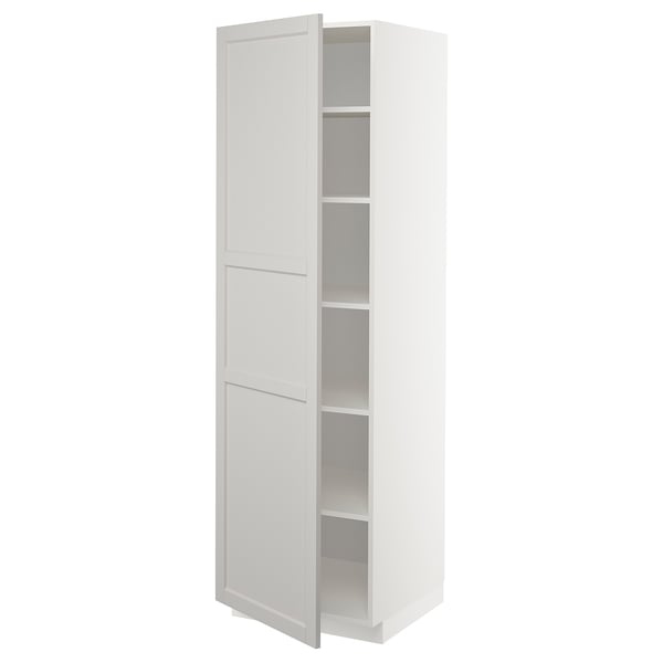 White METOD cabinet with beveled doors, tall and slim, minimalist design, adjustable shelves.