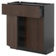 Dark brown METOD kitchen unit with wooden drawer and shelves.