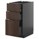 Modern kitchen cabinet with dark brown wood grain drawers, sleek handles, and black sides. Three pull-out drawers, part of the METOD system.