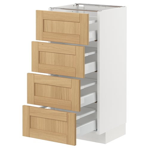 White METOD cabinet with four light wooden drawers, partially pulled out.
