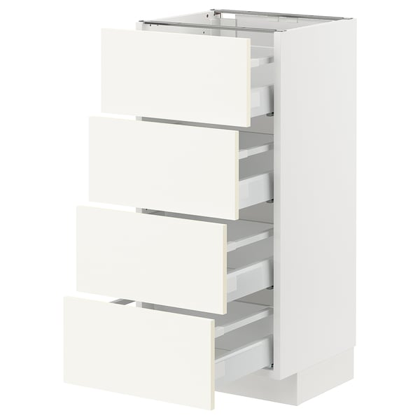 A white ikea METOD kitchen unit with four pull-out drawers, neatly organized and modern in design.