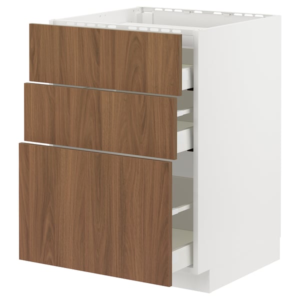 A white METOD kitchen cabinet with three wooden drawers in walnut. The drawers have a sleek, modern design with smooth surfaces and simple handles.