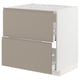 Modern kitchen cabinet, beige, square, with sleek grey handles.