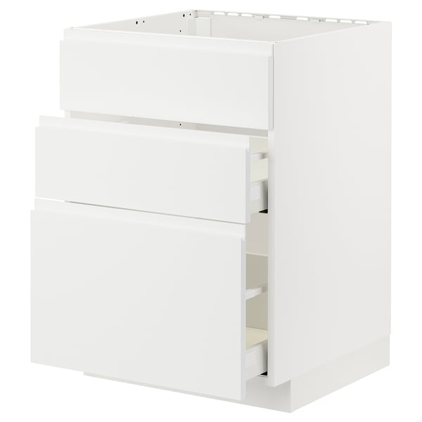 A white METOD kitchen cabinet with two open drawers. The is: white METOD kitchen cabinet with two open drawers, sleek design.