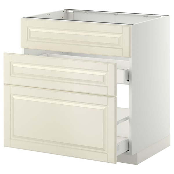 An off-white METOD kitchen cabinet with two drawers and a door, featuring beveled edges and a smooth finish.