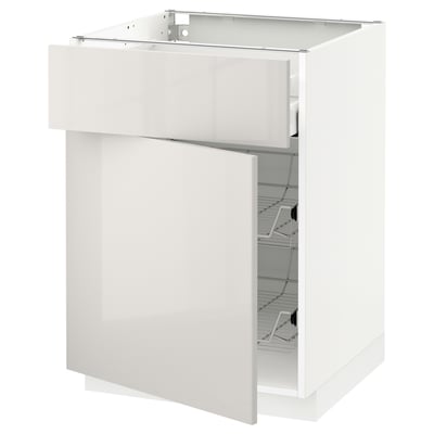 A white METOD kitchen cabinet with a modern glossy finish, sleek design, and integrated drawer.
