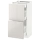 White METOD kitchen cabinet, glossy, with two drawers, sleek design.