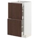 METOD kitchen cabinet with dark brown wood drawers and white frame.