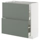 Modular kitchen unit with grey-green drawers and white frame, sleek modern design.
