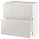 METOD high-gloss white kitchen cabinet with open drawers for storage.
