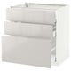 White METOD kitchen cabinet, glossy finish, rectangular shape with three open drawers.