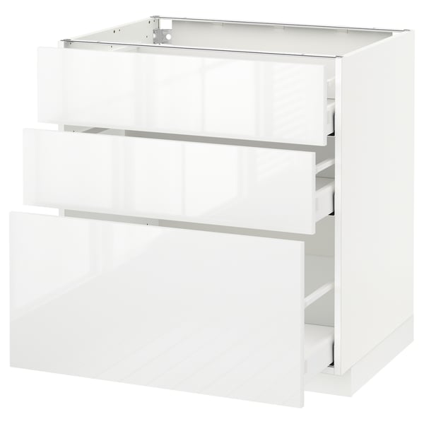 White high-gloss kitchen unit with three drawers.