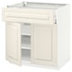 Off-white METOD kitchen cabinet with bevelled doors and drawers, featuring a sturdy frame and soft-closing drawers.