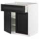 Modern black stained ash kitchen cabinet with white interior, soft close drawer, and adjustable shelves.