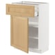 Modern kitchen unit with light wood door and shelves. Open drawer, white frame, oak finish.
