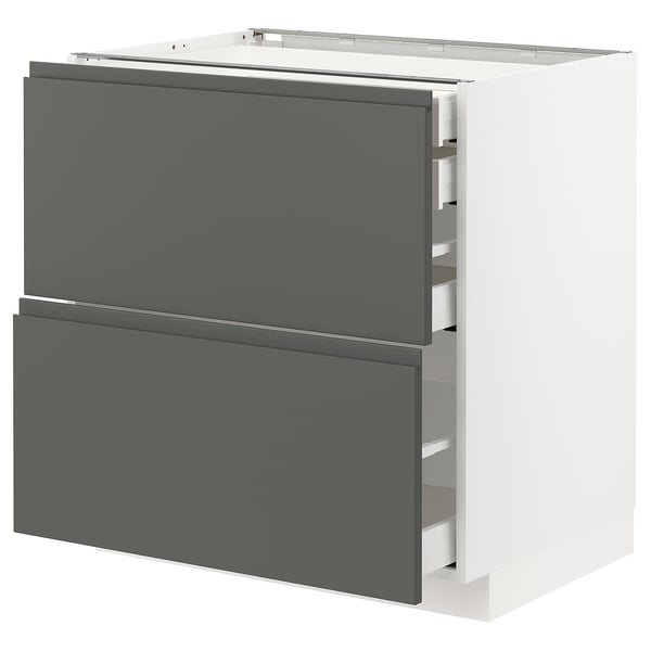 Modern white kitchen cabinet with two dark grey drawers, soft-close.