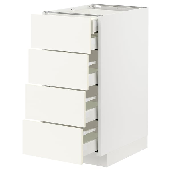 White METOD kitchen cabinet with four pull-out drawers, sleek modern design.