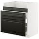 Black and white modern kitchen unit with sleek drawer fronts and white cabinet frame.