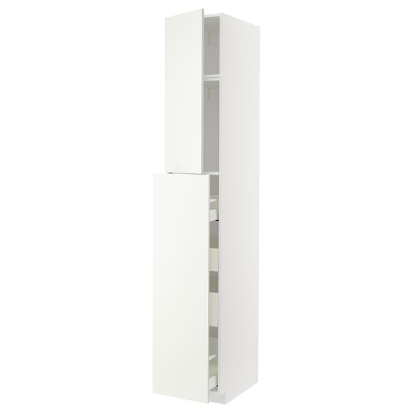 A white METOD kitchen cabinet. It has multiple shelves and a sleek, modern design.