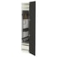 A modern, black METOD kitchen cabinet with adjustable shelves and a pull-out drawer.