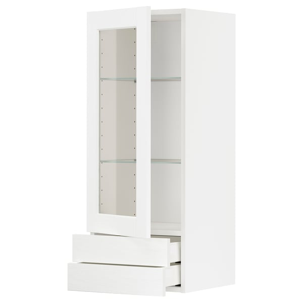 White METOD kitchen unit with glass doors featuring glass shelves and soft-close drawers.