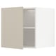 Beige METOD kitchen cabinet with adjustable shelves.