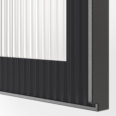 Modern kitchen cabinet with sleek, reeded glass door in black, featuring a sturdy metal frame.