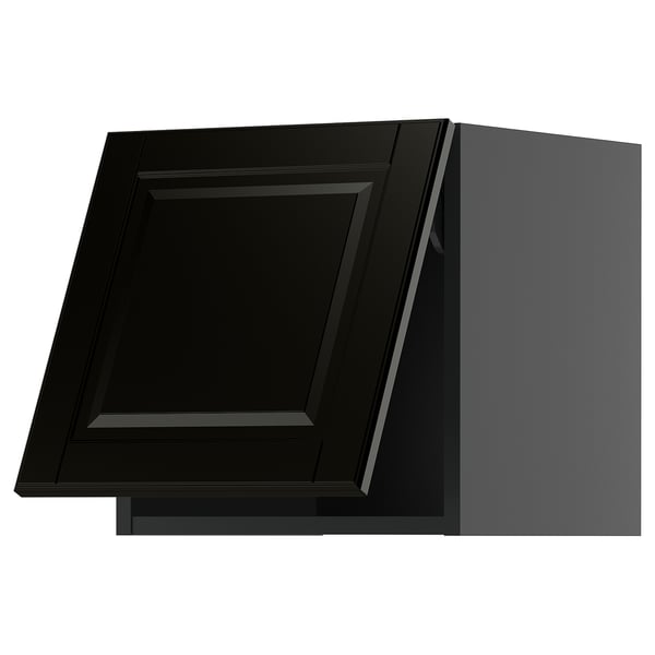Black kitchen cabinet with glossy finish, angled view, sleek modern design, high contrast edges.