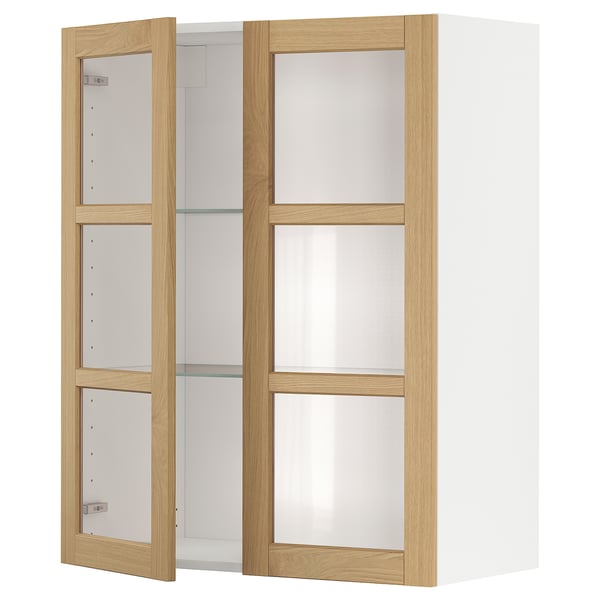 Open white METOD wall cabinet with oak doors and glass shelves.