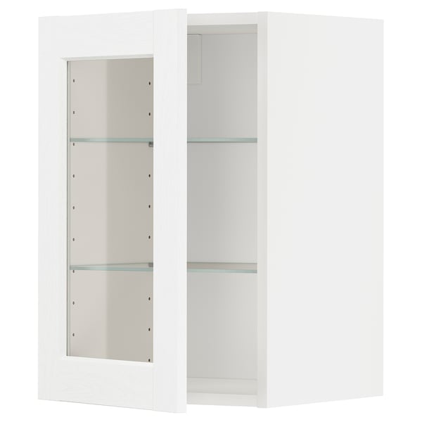 METOD white kitchen cabinet with glass shelves.