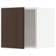 Dark wooden cabinet door partially open, revealing white interior. Sleek edges, modern design.