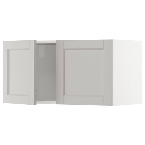METOD kitchen cabinet: white, square, bevelled edges, with one open door, solid birch frame.