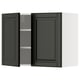 Modern black kitchen cabinet with bevelled edges, two-door design, featuring shelves inside.