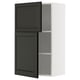 Modern black kitchen cabinet with adjustable shelf, sleek design, beveled edges.